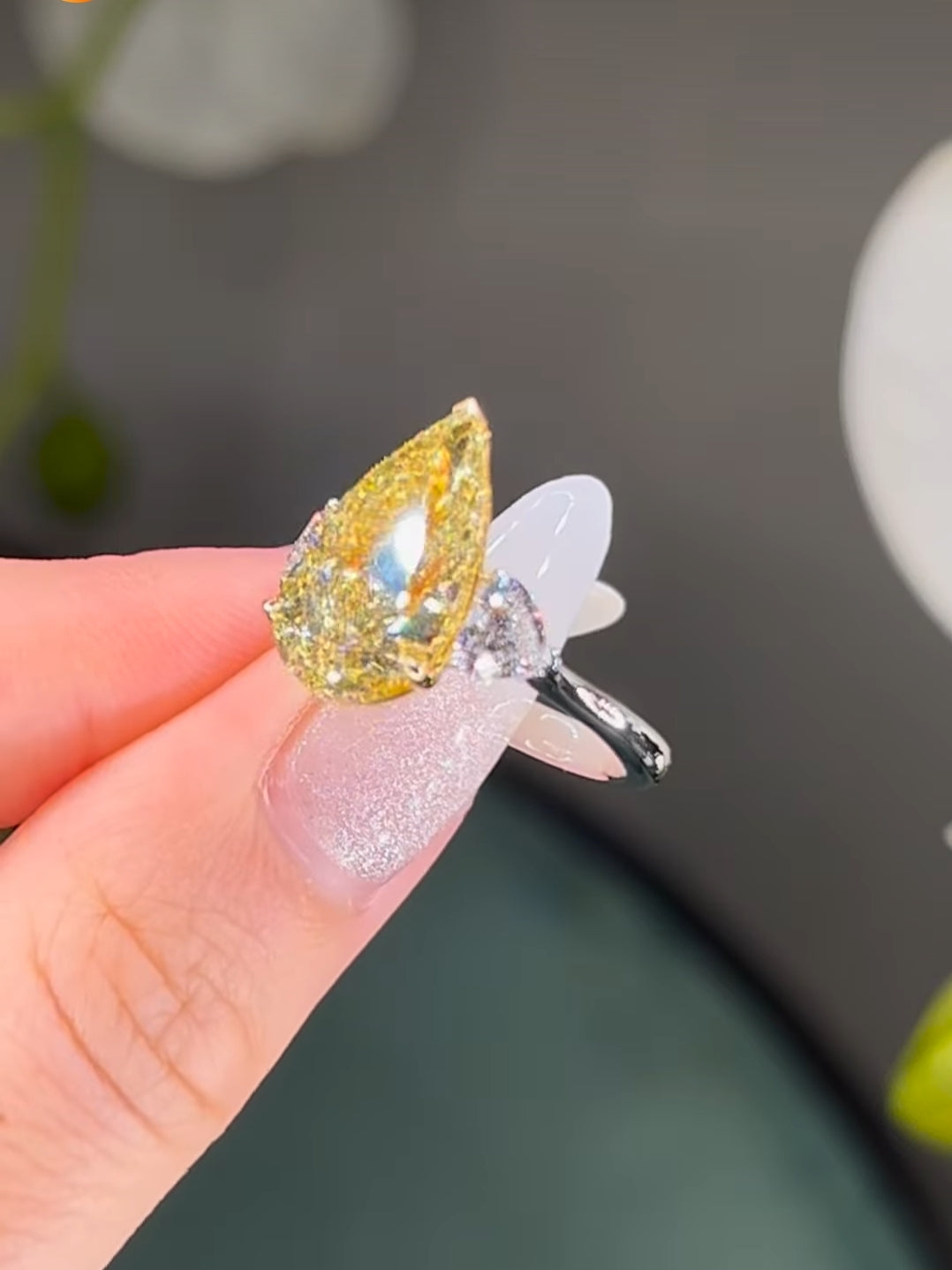 7*10 mm (2.10ct) pear shape fancy yellow and 4mm (0.60ct) White F VVS1 Labgrown diamond Engagement Ring with 14k white gold