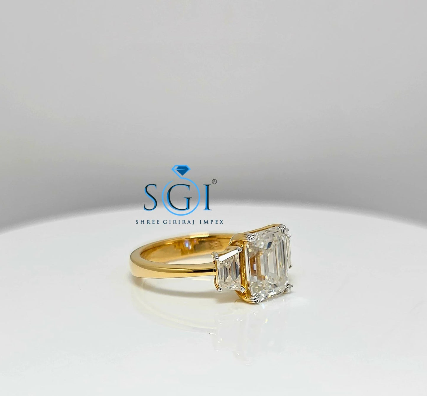 Elegant Emerald Cut Moissanite Engagement Ring – 3-Stone Yellow Gold Setting