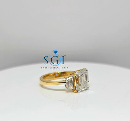 Elegant Emerald Cut Moissanite Engagement Ring – 3-Stone Yellow Gold Setting