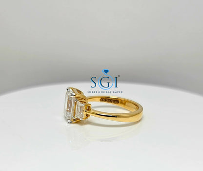 Elegant Emerald Cut Moissanite Engagement Ring – 3-Stone Yellow Gold Setting