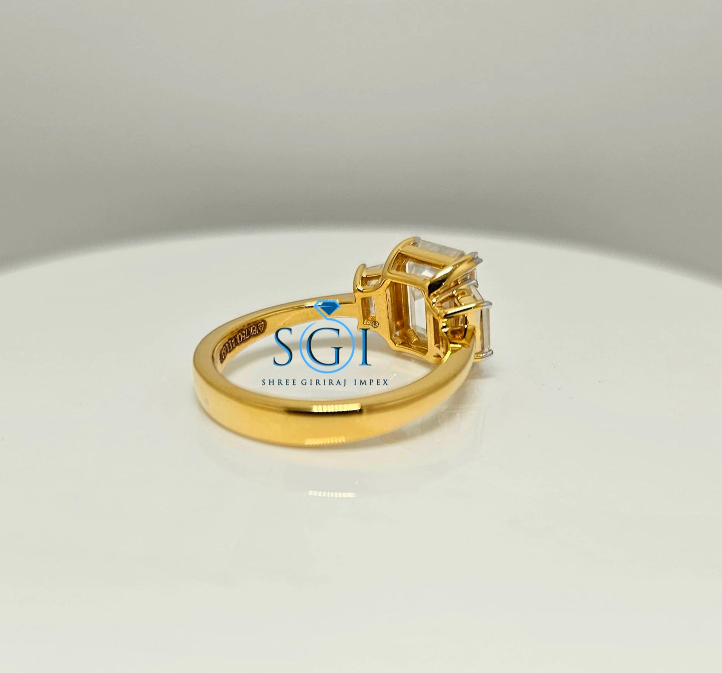 Elegant Emerald Cut Moissanite Engagement Ring – 3-Stone Yellow Gold Setting